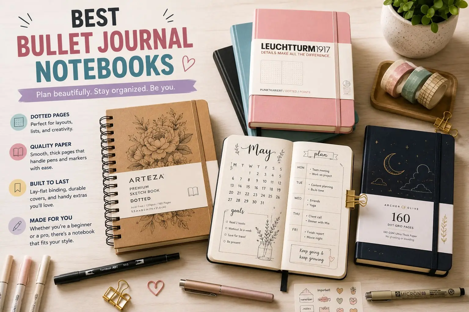 Bullet journal notebooks with dotted pages, a monthly planner spread, pens, washi tape and stationery arranged on a bright pastel desk.